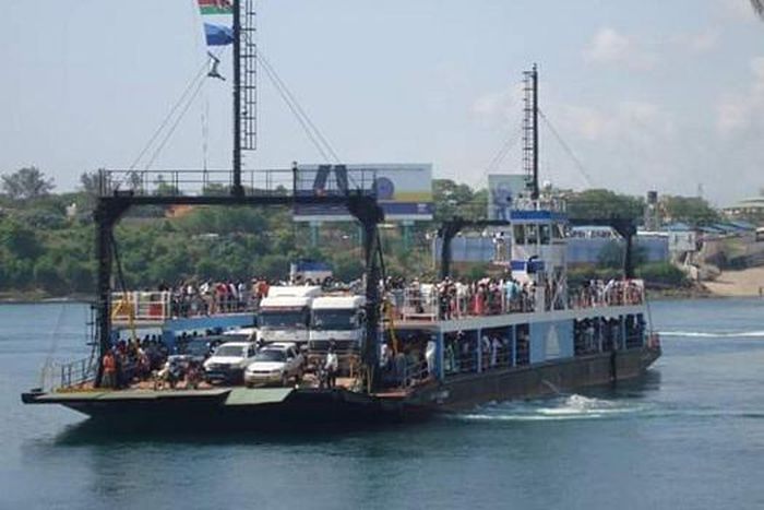 Police retrieve dead body that floated to the shore at the Likoni crossing in Mombasa