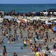 People enjoy Bahia de los Ninos beach in La Guaira, Vargas state, Venezuela