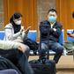 Passengers wearing masks to protect against the new coronavirus are pictured at Basra airport in southern Iraq in late January