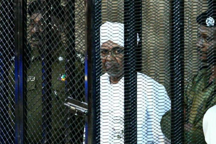 Sudan's ex-president Omar al-Bashir appears in court in Khartoum in August 2019