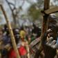 A soldier gestures with his wooden rifle at a UN-run programme to reconcile government troops with their former rebel enemies -- a key component of South Sudan's peace process