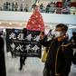 Protesters unfurled banners in shopping malls across Hong Kong