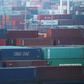 Shipping containers are stacked at the Port of Los Angeles in November 2019