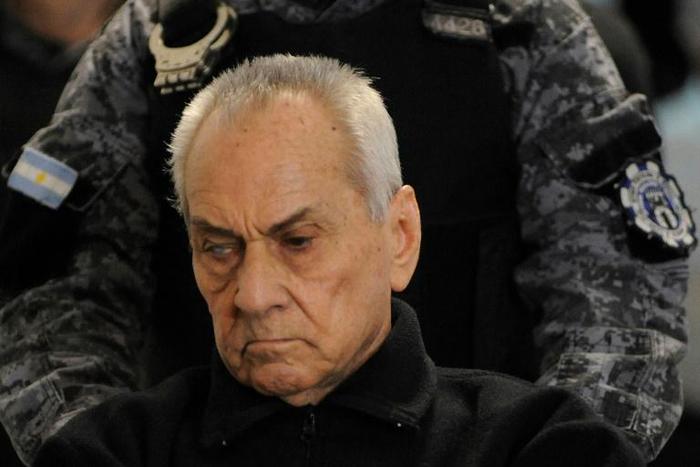 Italian Catholic priest Nicola Corradi being wheeled into court before being sentenced to 42 years for sexually abusing minors at a school for the deaf in Mendoza, Argentina