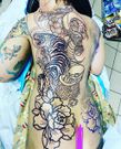 Ebru TV presenter shows off her full body tattoo (Photos)