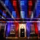 Red, white and blue lights illuminate 10 Downing Street, the official residence of Britain's Prime Minister, in central London after Britain left the European Union