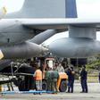 Chilean military personnel on December 13, 2019 offload the landing gear from the Hercules C-130 air force plane that crashed on its way to Antarctica, killing all 38 people on board