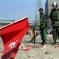Bangladeshi soldiers inspect the scene of the 2001 bomb blast in Dhaka