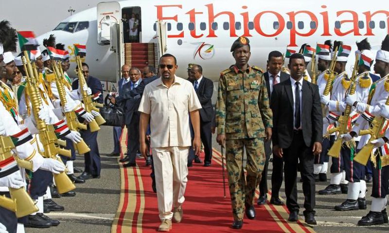 Ethiopia's Prime Minister Abiy Ahmed (C-L) hopes the election will give him the mandate to make broad reforms