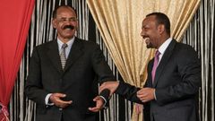 Eritrea's President Isaias Afwerki (L) and Ethiopia's Prime Minister Abiy Ahmed first met last year
