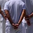 Suspected members of the Barrio 18 gang are pictured at Isidro Menendez Justice Court in San Salvador on February 6