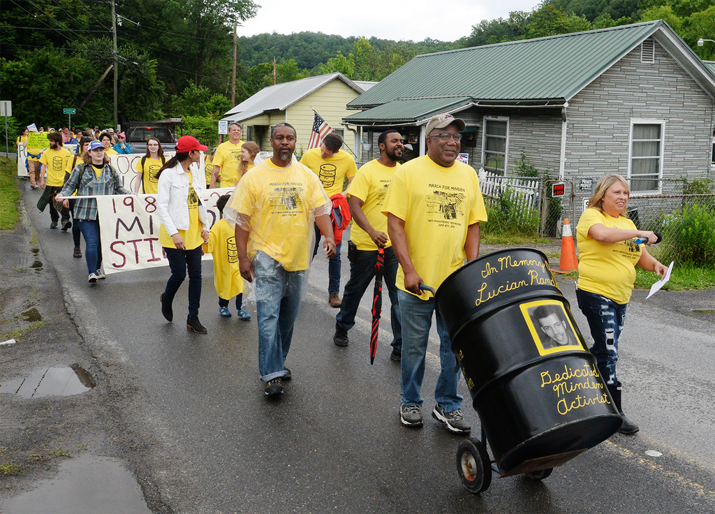 Frustrated by the waiting and worrying, Percy Fruit led a symbolic march out of Minden last June, pushing a barrel like those that had been dumped around town.