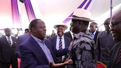 Interior Cabinet Secretary Dr Fred Matiangi having a chat with ODM leader Raila Odinga at a past event