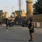 Iraqi counter-terrorism forces stand guard in front of the US embassy in the capital Baghdad