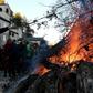 Two groups of rival worshippers gathered just 100 metres apart in the former royal capital Cetinje for the ritual lighting of a yule log