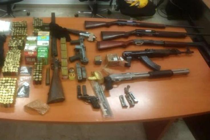 Weapons siezed during the raid by 2,500 police as well as army paratroopers
