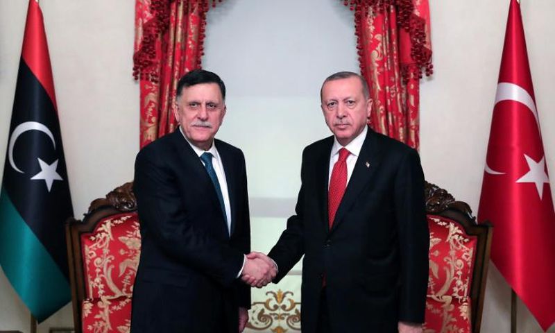 Turkish President Recep Tayyip Erdogan (R) meets with Fayez al-Sarraj, the head of the Tripoli-based Government of National Accord in Istanbul on November 27, 2019