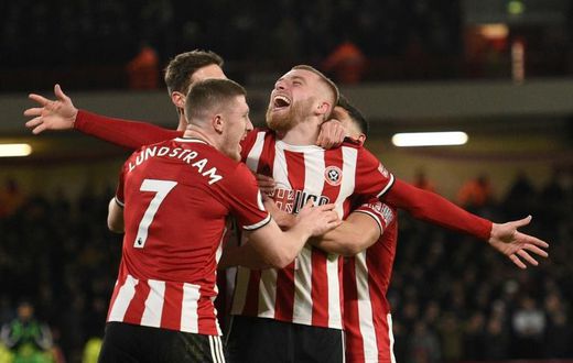 All smiles: Sheffield United are sixth in their first season back in the Premier League