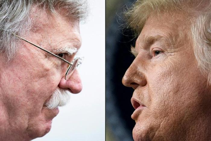 Former national security advisor John Bolton (L) reportedly says President Donald Trump wanted to freeze military aid to Ukrain until Kiev opened an investigation into Joe Biden, the frontrunner for the Democratic presidential nomination