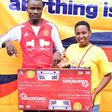 Kevin Musevi wins gas burner in Changamka na BB Ushinde promotion during Kisumu road show