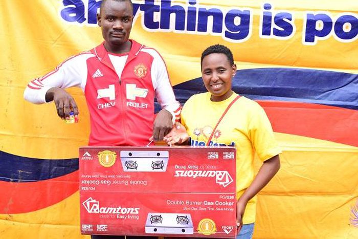 Kevin Musevi wins gas burner in Changamka na BB Ushinde promotion during Kisumu road show