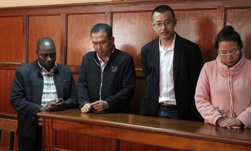 File image of a Kenyan National and three Chinese nationals who were arrested with wildlife trophies in 2029 at the Milimani Law Courts
