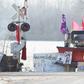 A First Nations protester walk in front of a snow plow blade that has signatures from the  Wetʼsuwetʼen hereditary chiefs as part of a train blockade in Tyendinaga, near Belleville, Ontario, Canada on February 21, 2020