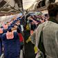 The first planeload of evacuees from China arrived in France on Friday and are in quarantine at a resort on the Mediterranean coast