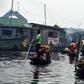 Several hundred thousand people live in Makoko -- a floating slum that officially does not exist