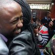 File image of Joseph Jowie Irungu hugging a female relative in court