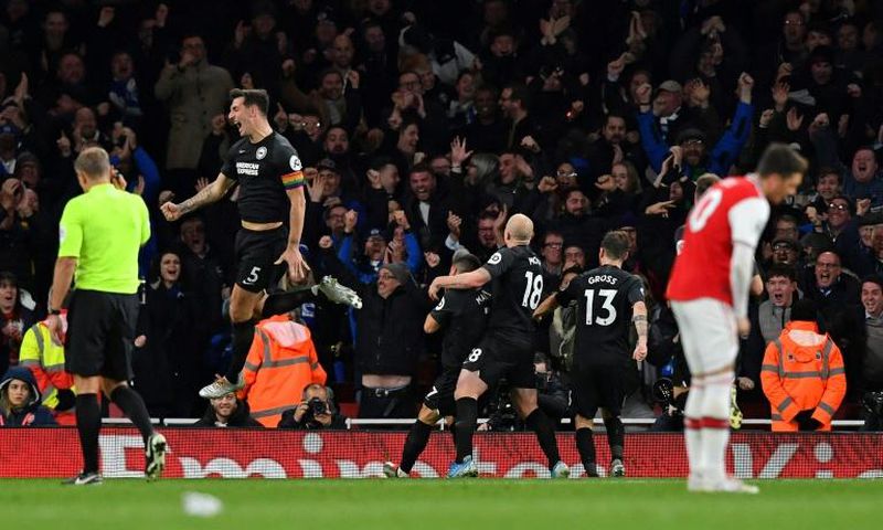Brighton players celebrate Neal Maupay's winner against Arsenal
