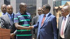 Imran Okoth with Raila Odinga, Junet Mohamed and Maina Kamanda