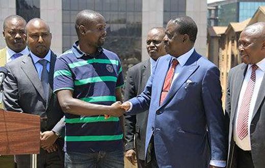 Imran Okoth with Raila Odinga, Junet Mohamed and Maina Kamanda