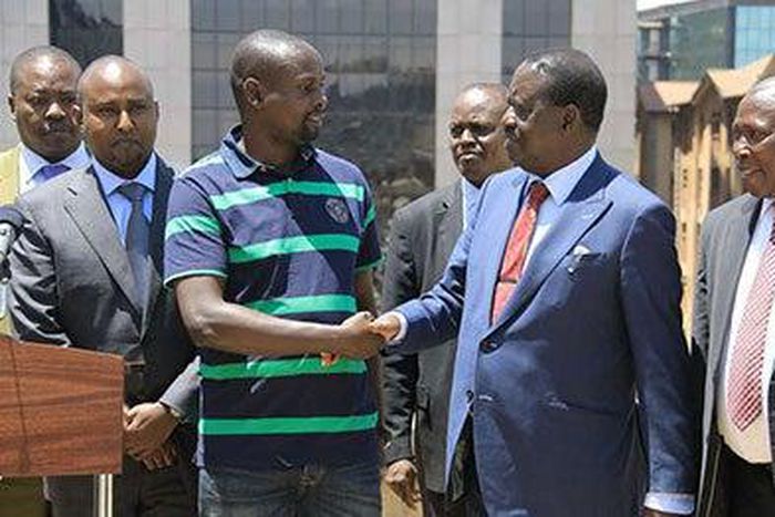 Imran Okoth with Raila Odinga, Junet Mohamed and Maina Kamanda