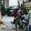 History student Ayesha Renna (red scarf) and three women have become protest symbols after they surrounded a young man to stop him from being beaten by police