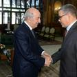 A handout picture released by the official Algeria Press Service (APS) shows Algerian President Abdelaziz Tebboune (L) receiving the newly appointed Prime Minister Abdelaziz Djerad in the capital Algiers on December 28, 2019