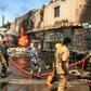 Sudanese firefighters tackle the deadly blaze in a north Khartoum ceramics factory