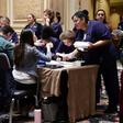 Workers at Las Vegas's luxurious Bellagio hotel checked in before taking part in Nevada's presidential caucuses