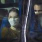 Passengers look on from a vehicle carrying French citizens evacuated from  Wuhan, China, near Marseille, France on January 31, 2020