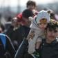 Some 13,000 migrants have amassed at the Turkey-Greece border, including families with young children who spent the night in the cold