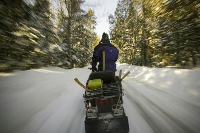 Snowmobiles are popular in Canada but can be dangerous -- a guide died and five French tourists were missing after the group plunged through ice