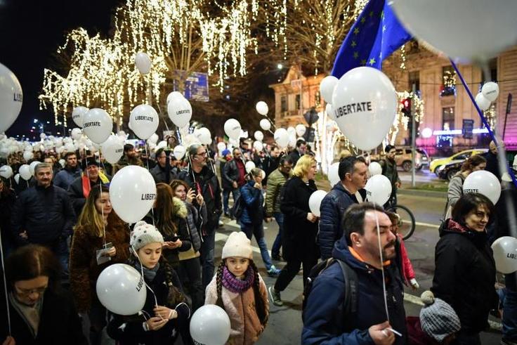 Hundreds of balloons were released in memory of the more than a thousand people3 killed during the revolution