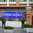 Police officers surrounded Phnom Penh Court on Wednesday as Cambodian opposition leader Kem Sokha arrived for his treason trial