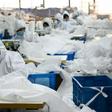 Ugly Duck Industry in Wenzhou, eastern China, has switched production from winter coats to hazmat suits