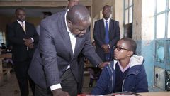 CS Fred Matiang’i shows his soft side with kind prayer to KCPE candidates at Gilgil school