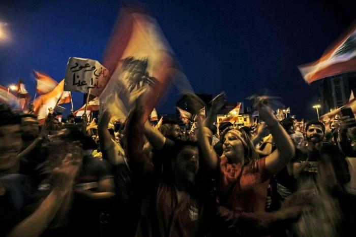 For days, hundreds of demonstrators have taken over Al-Nour Square in the heart of Tripoli for protest raves after dark in scenes unprecedented for Lebanon's relatively conservative Sunni Muslim heartland