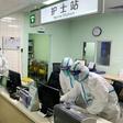 At hospitals across Wuhan, patients with high temperatures turned out in large numbers to get checked