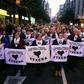 Relatives of Basque prisoners hold banners reading "Basques prisoners and fugitives back home" during a protest in the northern Spanish city of Bilbao to demand the transfer of ETA prisoners to jails near their homes