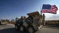 A convoy of US troops is pictured outside the Kurdish-majority city of Qamishli, in Syria's northeastern Hasakeh province on November 2, 2019