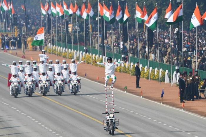 For the first time, the riders performing daredevil stunts on motorbikes to the delight of the crowds lining New Delhi's central Rajpath boulevard, were women